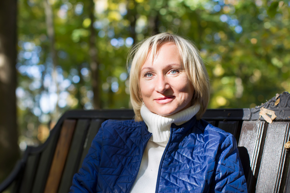 Ordinary Middle-Aged Woman on a Park Bench