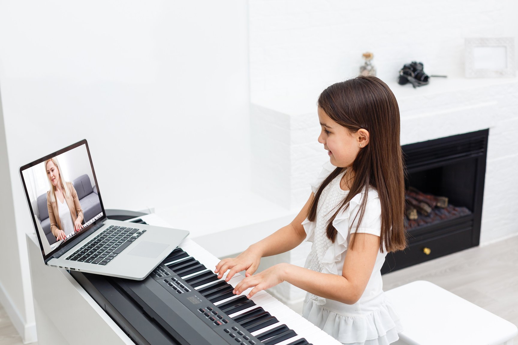 Scene of Piano Lessons Online Training or E-Class Learning While