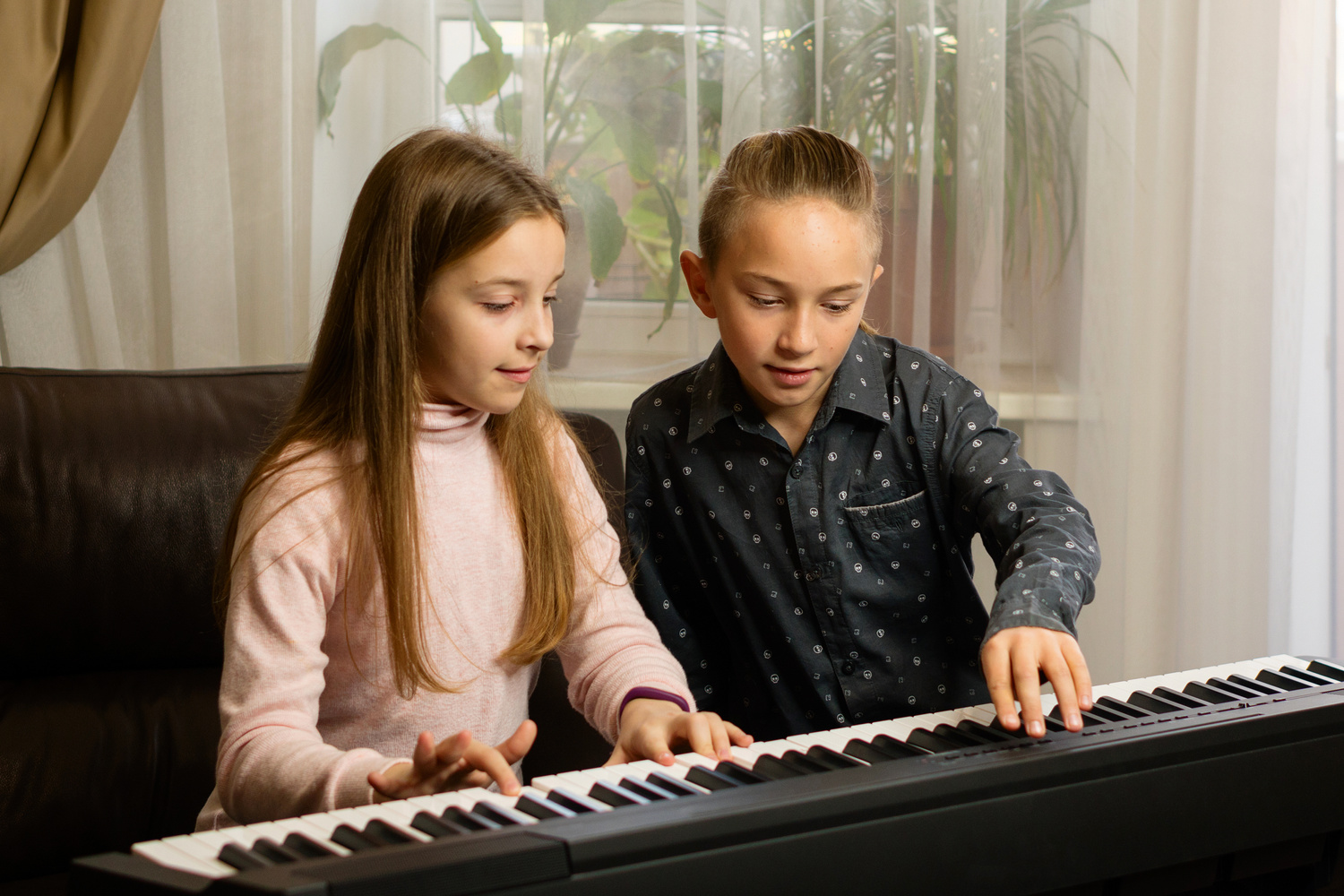 Young Duo Playing Piano